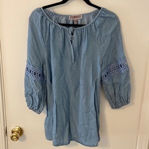 Blue blouse with crochet accents